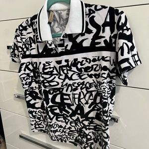 AUTHENTIC VERSACE men’s polo. A real head turner. Size small.